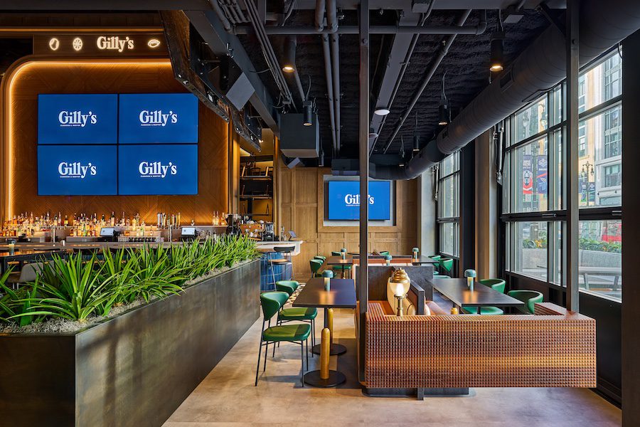 gilly's clubhouse, rooftop at gilly's, saksey's tri-level sports entertainment bar dining destination converted department store kay baum, interior tvs high top tables