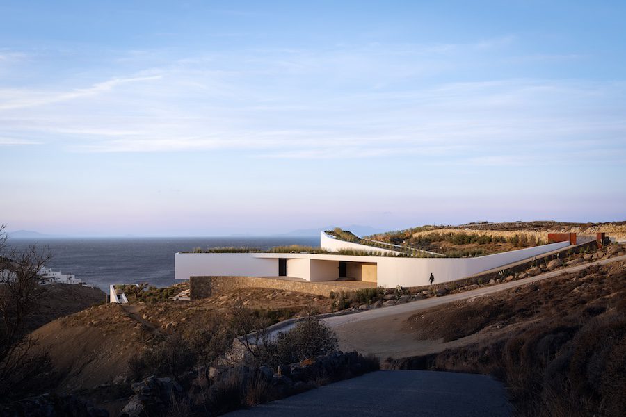 Aimasia Villa mykonos greece exterior rugged terrain coast ocean