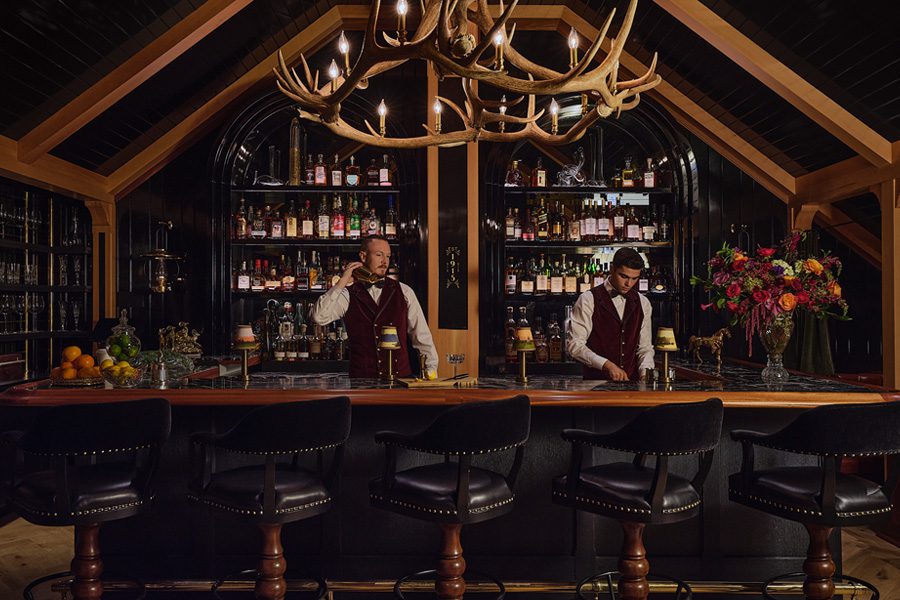 the radical hotel asheville north carolina river arts district afterglow restaurant gold chains around racetrack bar